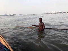 An inhabitant of Makoko, a town on stilts in the center of Lagos