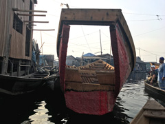 Makoko: a boat being built.