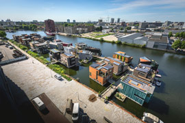Very modern floating houses in Amsterdam: A village floating in a canal: Schoonschip