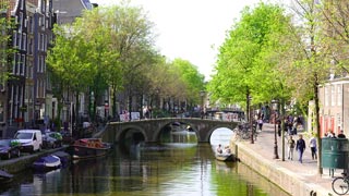 The canals are an essential element of the charms of the city of Amsterdam