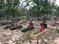 The cemetary 50 metres away from Maria's home